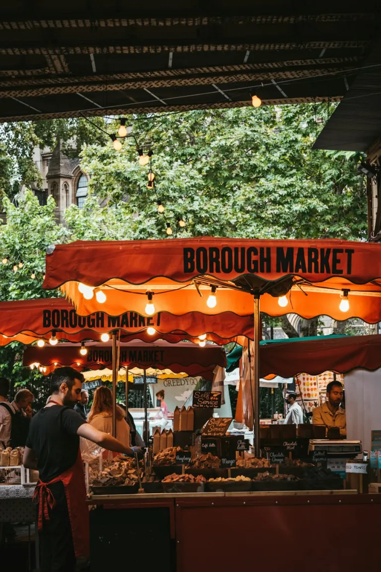 People eating at Borough Market beneath the railway arches