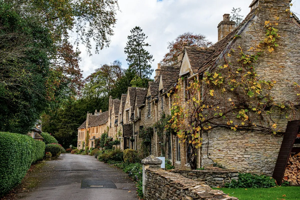 Stone cottages along the street in Castle Combe, Cotswolds