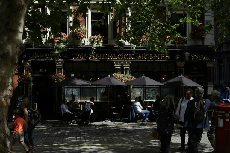 People gathered outside a restaurant on a night out